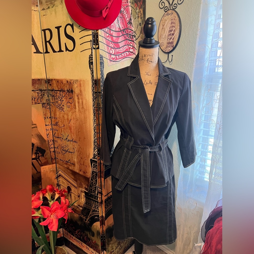 Black suit. Very soft/light denim feel.